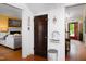 Charming hallway with views of a living room and entry way at 1603 Hermitage Ct, Durham, NC 27707