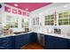 Updated kitchen with stainless steel appliances, marble countertops, and open shelving at 1603 Hermitage Ct, Durham, NC 27707