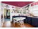 Charming kitchen features an eat-in area, open shelving, and updated counter tops at 1603 Hermitage Ct, Durham, NC 27707