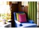 A cozy chair by the window is brightly lit and provides a great place to sit and relax at 1603 Hermitage Ct, Durham, NC 27707