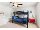 Neutral bedroom features a bunk bed, a dresser, and fun decorations at 176 Belleforte Park Cir, Garner, NC 27529
