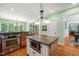 Spacious kitchen with a kitchen island, stainless steel appliances, and hardwood floors at 19002 Stone Brk, Chapel Hill, NC 27517