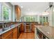 Lovely kitchen featuring custom cabinets, stainless steel appliances, and a center island at 19002 Stone Brk, Chapel Hill, NC 27517