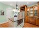 Well-designed kitchen featuring stainless steel appliances, custom cabinets, and a kitchen island at 19002 Stone Brk, Chapel Hill, NC 27517