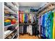 Well-organized walk-in closet with ample shelving and hanging space for clothes and shoes at 19002 Stone Brk, Chapel Hill, NC 27517