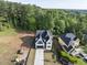 Beautiful aerial view of a newly constructed home with mature trees and lush landscaping at 1904 French Dr, Raleigh, NC 27612
