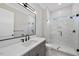Bright bathroom showcases quartz countertop, modern fixtures, and a glass shower at 1904 French Dr, Raleigh, NC 27612
