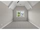 Bedroom featuring neutral paint and carpet, ceiling fan and double-window view at 1904 French Dr, Raleigh, NC 27612