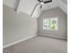Bedroom featuring neutral paint and carpet, ceiling fan and window view at 1904 French Dr, Raleigh, NC 27612