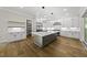 Spacious kitchen featuring a large island and stainless steel appliances at 1904 French Dr, Raleigh, NC 27612