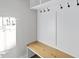 Practical mudroom features a built-in bench, hooks, and storage at 1904 French Dr, Raleigh, NC 27612