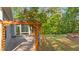 Cozy back patio with pergola and brick pavers, perfect for outdoor relaxation at 2005 Delphi Way, Wake Forest, NC 27587