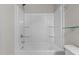 Neutral bathroom with shower and tub features wall mounted shower head and built in shelves at 2005 Delphi Way, Wake Forest, NC 27587