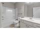 Well-maintained bathroom featuring a shower-tub combo, neutral walls, and vanity with sink at 2005 Delphi Way, Wake Forest, NC 27587