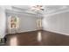 Spacious bedroom features trey ceilings, hardwood floors, and natural light at 2005 Delphi Way, Wake Forest, NC 27587