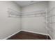 Spacious walk-in closet with a wire shelving system for optimal storage and organization at 2005 Delphi Way, Wake Forest, NC 27587