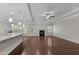 Bright living room with hardwood floors, recessed lighting, and a charming fireplace, and lots of natural light at 2005 Delphi Way, Wake Forest, NC 27587