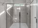 Glass enclosed shower with tile surround at 2005 Delphi Way, Wake Forest, NC 27587