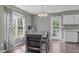 Dining area featuring natural light from the window and hardwood floors at 205 Twin Oaks Dr, Angier, NC 27501