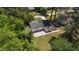 Aerial view of home with a manicured lawn and white exterior, offering great curb appeal at 207 N Aiken St, Fuquay Varina, NC 27526