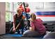 Trainer working with client in a fitness center at 208 Vervain Way, Holly Springs, NC 27540
