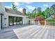 Expansive backyard deck with white railings, providing an ideal outdoor space for relaxation and entertaining at 212 Ronaldsby Dr, Cary, NC 27511