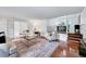 Spacious living room with hardwood floors that lead to dining room at 212 Ronaldsby Dr, Cary, NC 27511