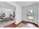 Hardwood floors welcome you to this well lit living room, featuring a large window at 212 Ronaldsby Dr, Cary, NC 27511