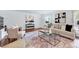 Cozy living room showcasing modern furnishings, a decorative rug, and elegant decor at 212 Ronaldsby Dr, Cary, NC 27511