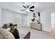 Cozy living room features plush seating, neutral decor, and abundant natural light, offering a comfortable living space at 212 Ronaldsby Dr, Cary, NC 27511