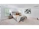 Spacious bedroom with neutral tones, natural light, and comfortable furnishings at 212 Ronaldsby Dr, Cary, NC 27511