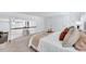 Upstairs primary bedroom with a sitting area, plush carpet, and ample natural light, creates a relaxing retreat at 212 Ronaldsby Dr, Cary, NC 27511