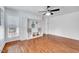 Well-lit mud room features built-in storage, bench seating, and hardwood floors for an organized entry space at 212 Ronaldsby Dr, Cary, NC 27511