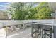 Inviting deck offers outdoor dining and lounge spaces with string lights at 219 Northwood Cir, Durham, NC 27701
