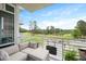 Balcony featuring outdoor seating and scenic views of the golf course at 2202 Environ Way # Bldg 2000, Chapel Hill, NC 27517