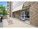 Exterior view of the building entrance with benches and well-maintained landscaping at 2202 Environ Way # Bldg 2000, Chapel Hill, NC 27517