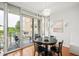 Dining area leading to balcony with great natural light at 2202 Environ Way # Bldg 2000, Chapel Hill, NC 27517