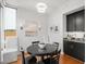 Bright dining room with modern lighting and convenient bar area at 2202 Environ Way # Bldg 2000, Chapel Hill, NC 27517