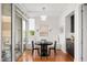 Dining room with black table and chairs next to sliding glass door at 2202 Environ Way # Bldg 2000, Chapel Hill, NC 27517