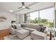 Bright living room featuring sectional sofa, ottoman, and a large window providing scenic views at 2202 Environ Way # Bldg 2000, Chapel Hill, NC 27517
