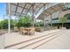 Relaxing outdoor patio area with comfortable seating and a shaded pergola at 2202 Environ Way # Bldg 2000, Chapel Hill, NC 27517