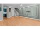 Bright, spacious living room with contemporary trim, hardwood floors and a ceiling fan at 2210 Raven Rd # 105, Raleigh, NC 27614