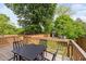 Spacious backyard deck for outdoor entertaining with yard view at 2325 Sheffield Rd # 102, Raleigh, NC 27610