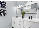 Modern bathroom featuring double vanity, sleek fixtures and contemporary design at 2325 Sheffield Rd # 102, Raleigh, NC 27610