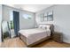 Cozy bedroom with soft lighting, neutral decor, and stylish furnishings at 2325 Sheffield Rd # 102, Raleigh, NC 27610
