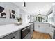 Contemporary kitchen featuring sleek countertops, stainless steel appliances, and an open layout at 2325 Sheffield Rd # 102, Raleigh, NC 27610