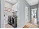 Functional laundry room equipped with modern appliances and ample storage at 2325 Sheffield Rd # 102, Raleigh, NC 27610