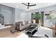 Inviting living room featuring modern decor, comfortable seating, and wood-style flooring at 2325 Sheffield Rd # 102, Raleigh, NC 27610