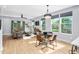 Open-concept living room with modern furnishings and a bright, airy atmosphere at 2325 Sheffield Rd # 102, Raleigh, NC 27610
