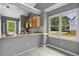 Well-lit kitchen featuring granite countertops and stainless steel appliances at 2402 Cynthia Dr, Durham, NC 27704